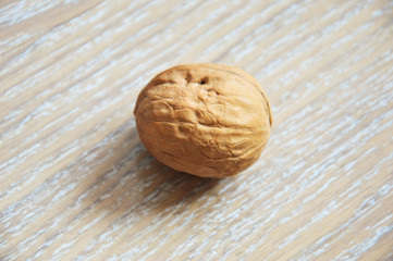 walnut on a light background. proper nutrition, nut in the shell.