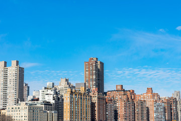 Fototapeta na wymiar Upper East Side New York City Skyline with a Blue Sky