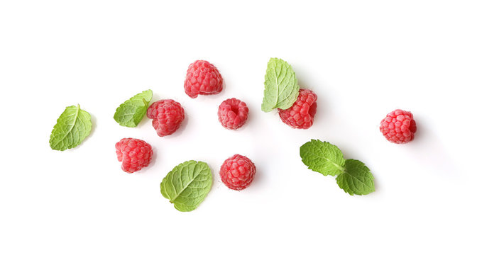 Ripe Rasberries And Mint Isolated On White Background. Top View