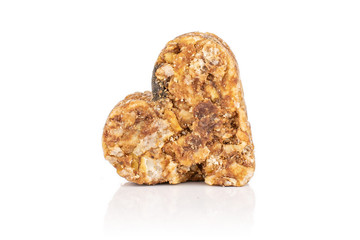 One whole healthy brown cereal heart with cocoa isolated on white background