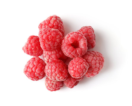 Pile of ripe rasberries isolated on white background