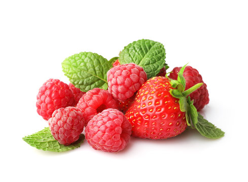 Strawberries and raspberries isolated on white background