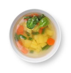 Vegetable soup isolated on white background. Top view