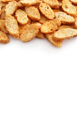 Small pieces of dried bread isolated on white