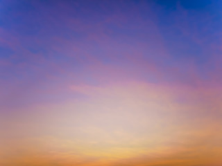 Fantasy twilight dawn blurred abstact background, Gold sunlight on blue sky and moving soft purple clouds before sunset
