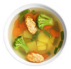 Vegetable soup isolated on white background. Top view