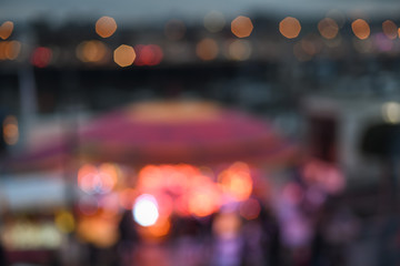 Blurred background with bokeh of a night city with lights.