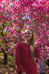 Blonde model in sakura garden 