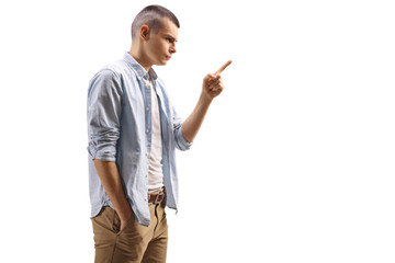 Angry young man gesturing with finger