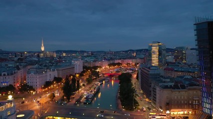 twilight time illumination vienna city famous riverside night life traffic aerial panorama 4k austria