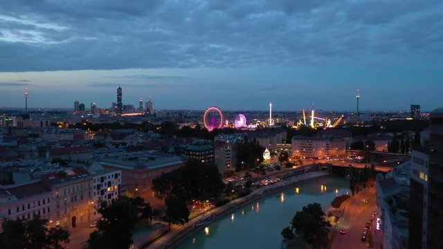 twilight time illumination vienna city famous theme park riverside aerial panorama 4k austria