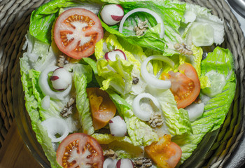 onion rings in my green salad with tomato bread and nuts