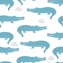 Seamless pattern with a cute blue crocodile.Vector illustration for printing on fabric, packaging paper, Wallpaper. Cute children's background.