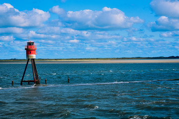 red coastal lighthouse 
