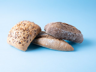 loaves of bread isolated on blue