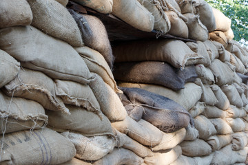 Obraz premium Military fortification of sandbags with loopholes.