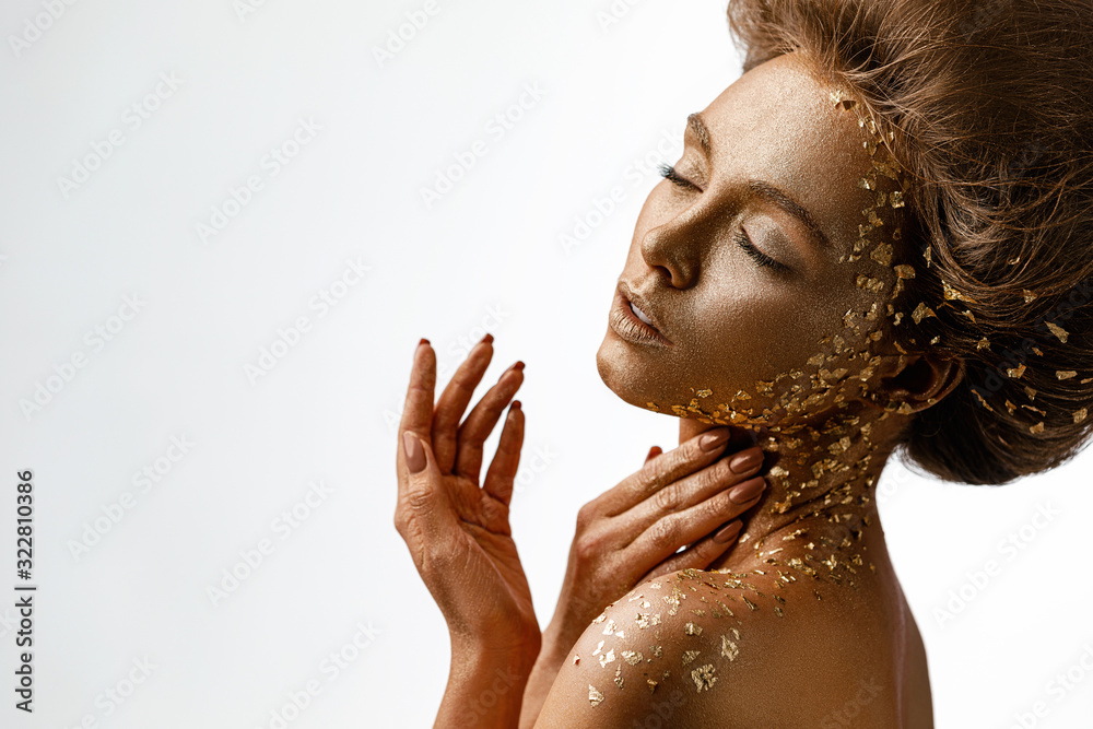 Wall mural fashion art portrait of model girl with holiday golden shiny professional makeup. tender woman with  - Wall murals