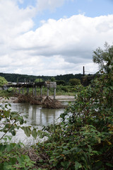 Obraz premium After the disaster. A small bridge that has been shredded.