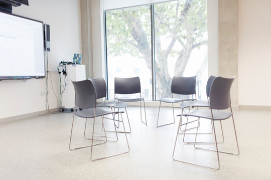 Chairs Arranged In Circle In Community Center Classroom