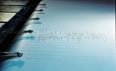 Swinging needle of seismograph at earthquake. © Anna