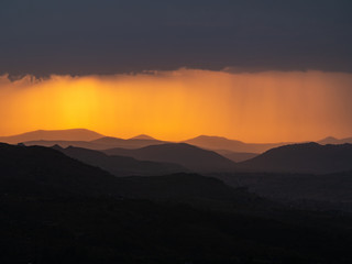 View across Cappadoccia valley from Uchisar Castle during sunset, Turkey