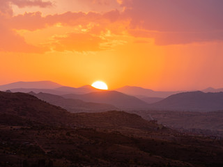 View across Cappadoccia valley from Uchisar Castle during sunset, Turkey