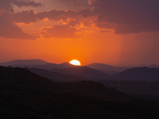 View across Cappadoccia valley from Uchisar Castle during sunset, Turkey