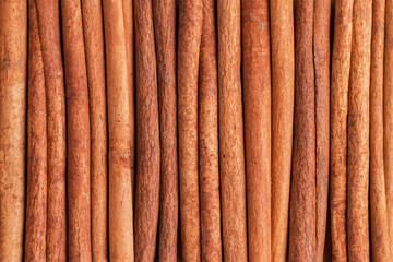 Lay flat closeup cinnamon sticks. Abstract trendy modern food texture background