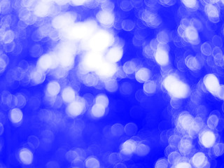 blue bokeh light background. blurred clouds sky