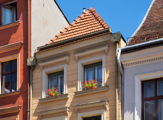 Fragment of old house at historical district of Torun. Poland