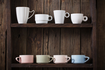  kitchen dishware on old dark wooden background