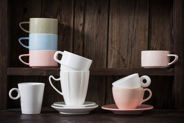 kitchen dishware on old dark wooden background