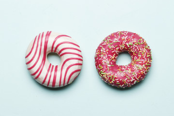 Sweet donuts on a blue background. Place for text