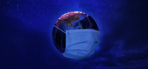 View of Earth from space with medical mask in neon tone. Concept of corona virus. Elements of this...