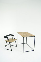 Deconstructivism chair and table in cyclorama on a white background