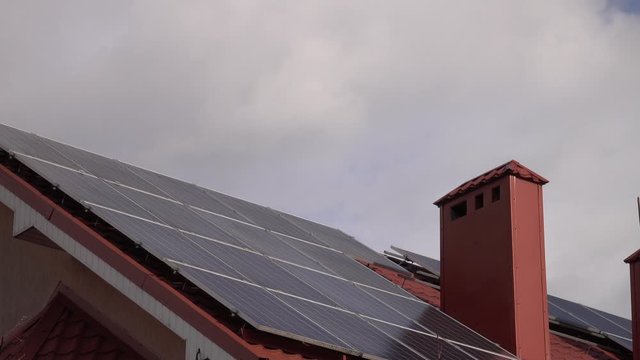 Solar PV modules mounted on rooftop of a house