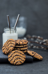 Cookies with peanuts, chocolate and sesame seeds