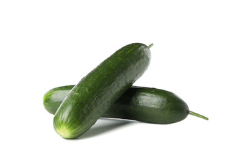 Fresh green cucumbers isolated on white background