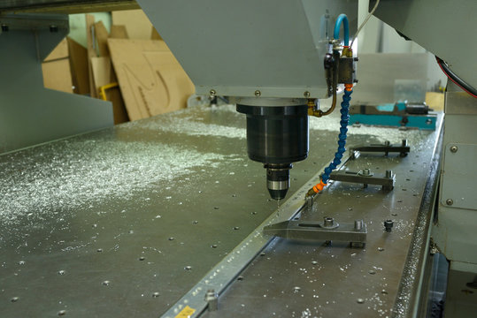 Computer Numerical Control Milling Machine Set For Work, Drill Boring Hole In A Metal Piece