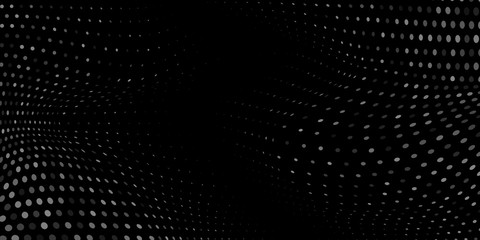 Abstract background made of halftone dots in white and black colors