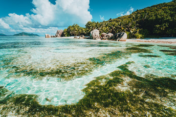 La Digue Island, Seychelles. World famous tropical beach Anse Source d'Argent with granite boulders