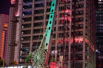 Construction site in front of modern building.