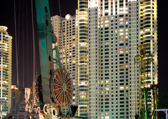 Construction site in front of modern building.