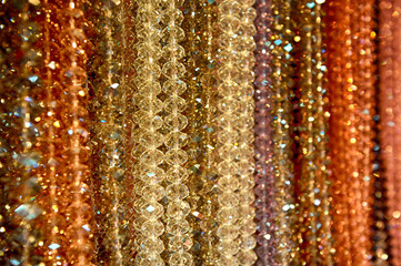 Hanging cheap glass necklaces, close-up view