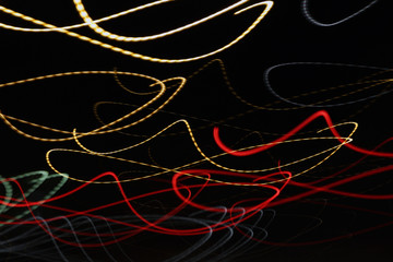 Colorful abstract line light art with black background. Conceptual art showing motion, pulse of the city of Helsinki & darkness of the night. Created by moving camera with long exposure.