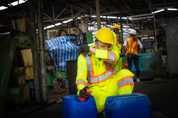 engineer working in industrial company with mechanical   receiving toxic substances.Hazardous...