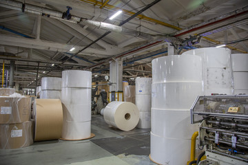 Industrial workshop of the Lambumiz plant. Production of laminated cardboard food packaging. Moscow, Russia