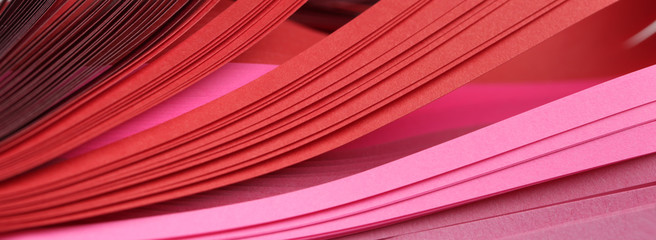 Abstract red and pink color strip paper background.