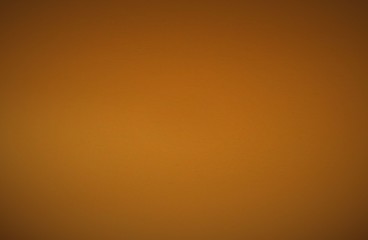 Abstract brown mustard out-of-focus background.  Blurred lines and spots.