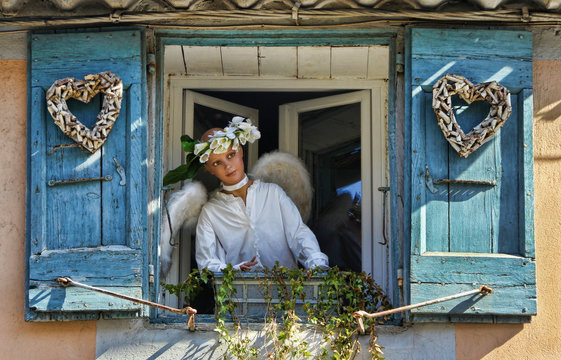 Angelic Doll Decorating a Window in a Carcasonne, France